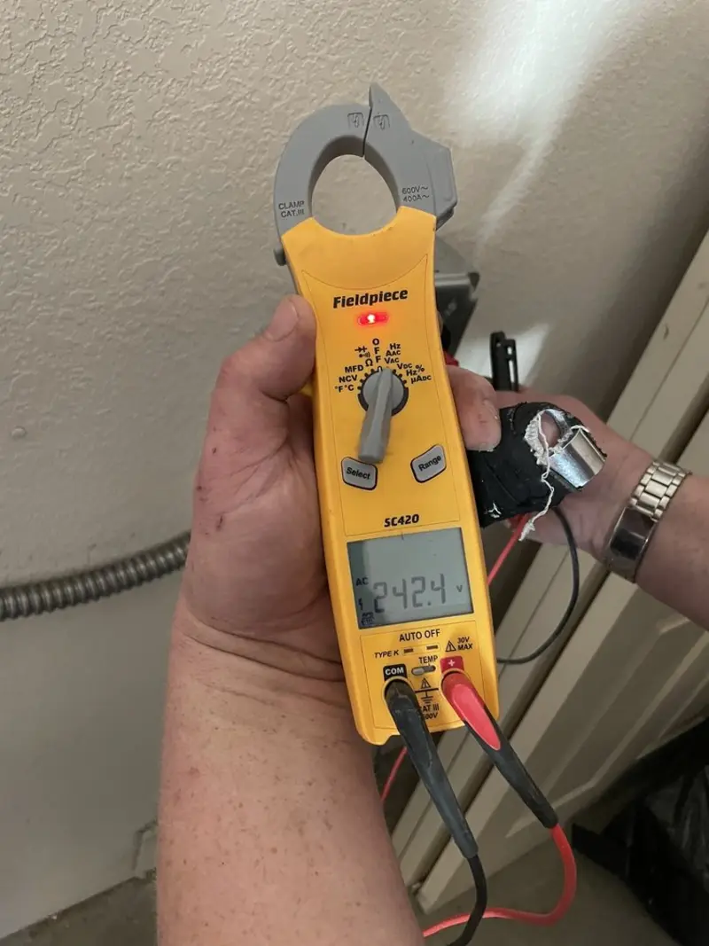 Voltage testing with clamp meter during Aluminum Wiring Replacement in Alvin